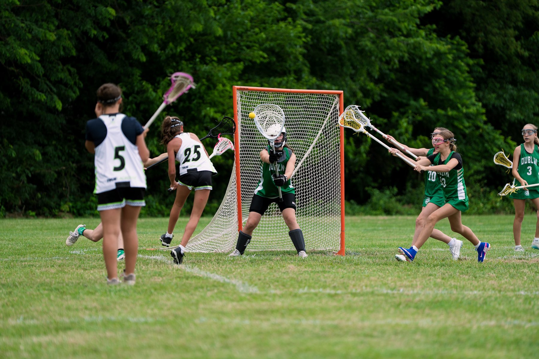 Dublin Lacrosse Club goalie defending the cage during tournament play