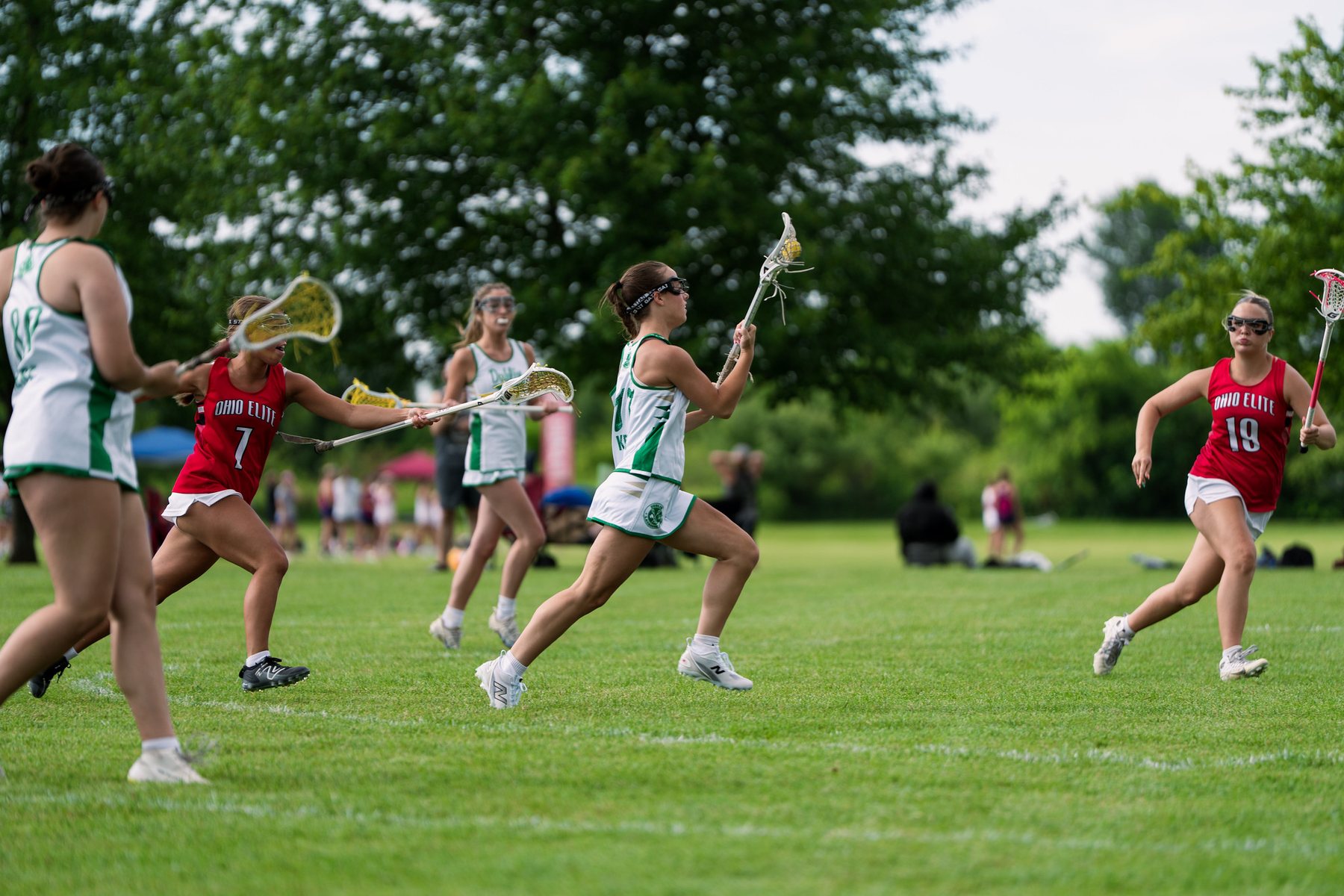 Dublin Lacrosse Club player moving the ball against tournament pressure