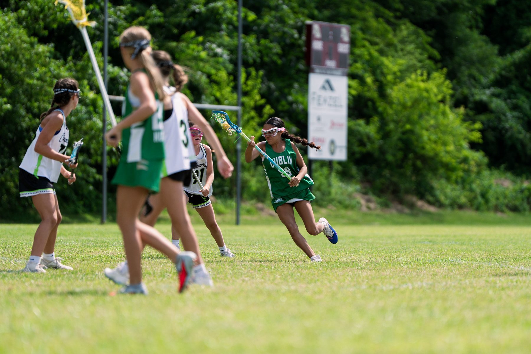 Dublin Lacrosse Club player shooting during a summer game
